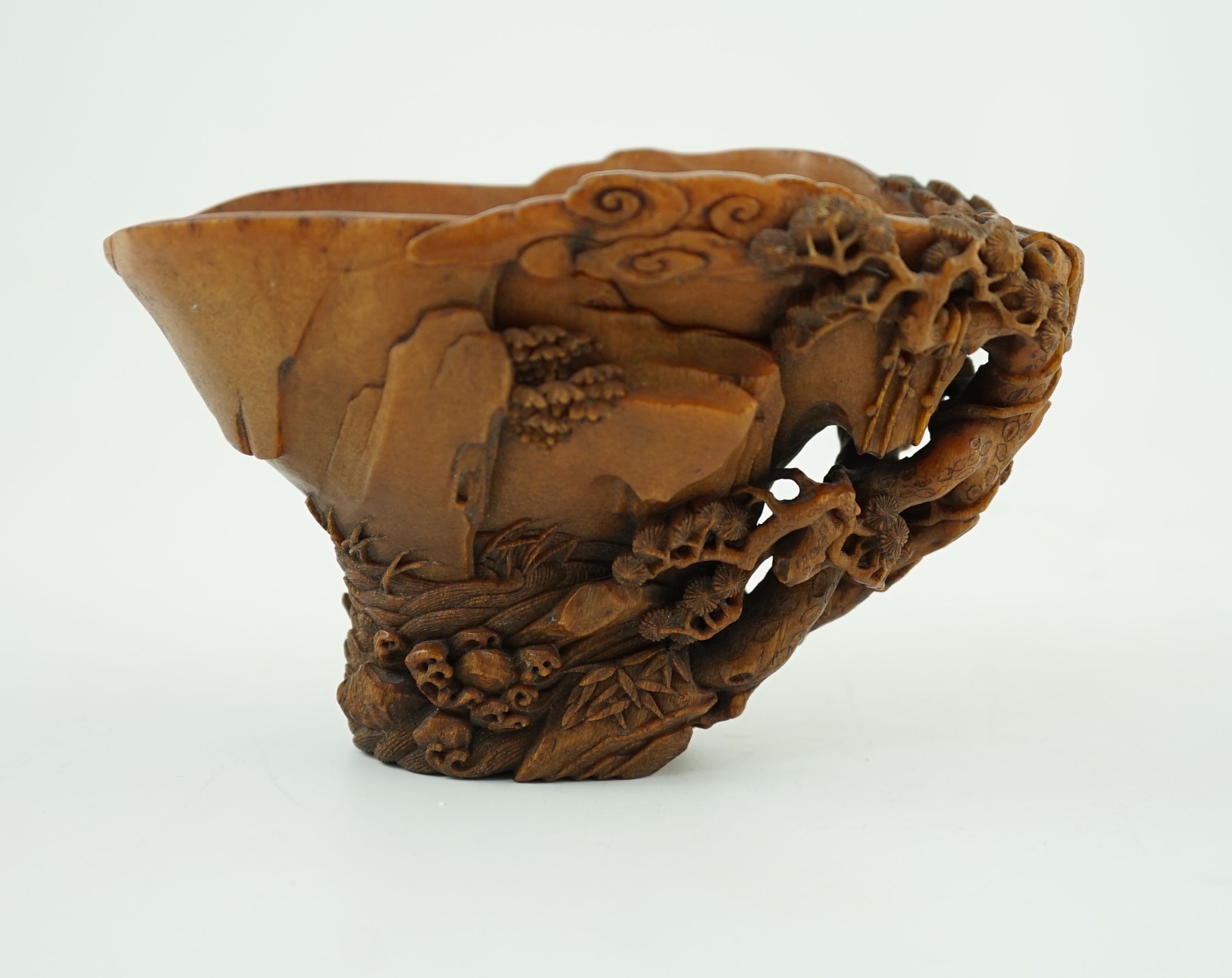 A fine Chinese rhinoceros horn ‘Ode to the Red Cliff’ libation cup, 17th/18th century, 15.2cm long, 9.8cm high